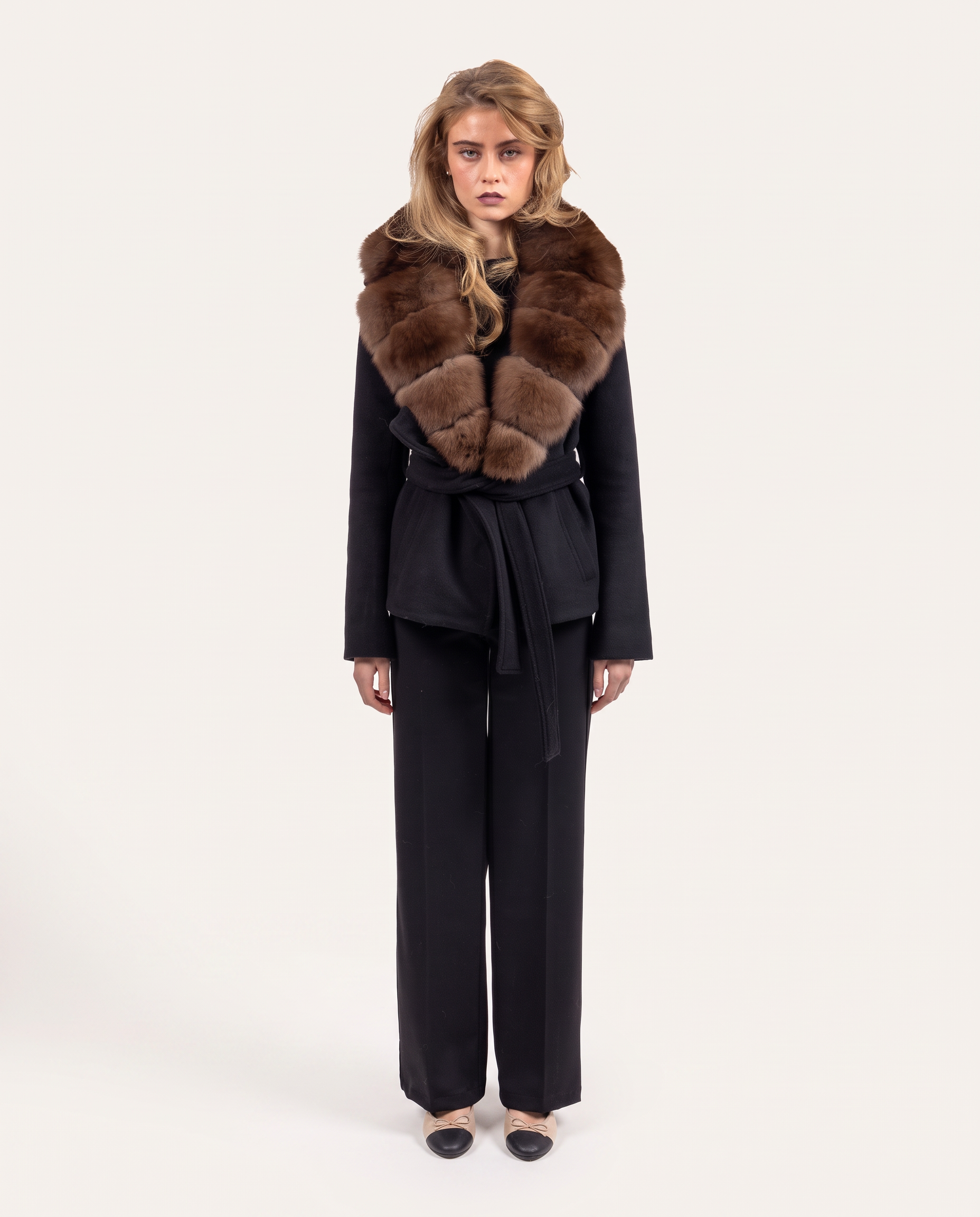 Fur coat on a cream background